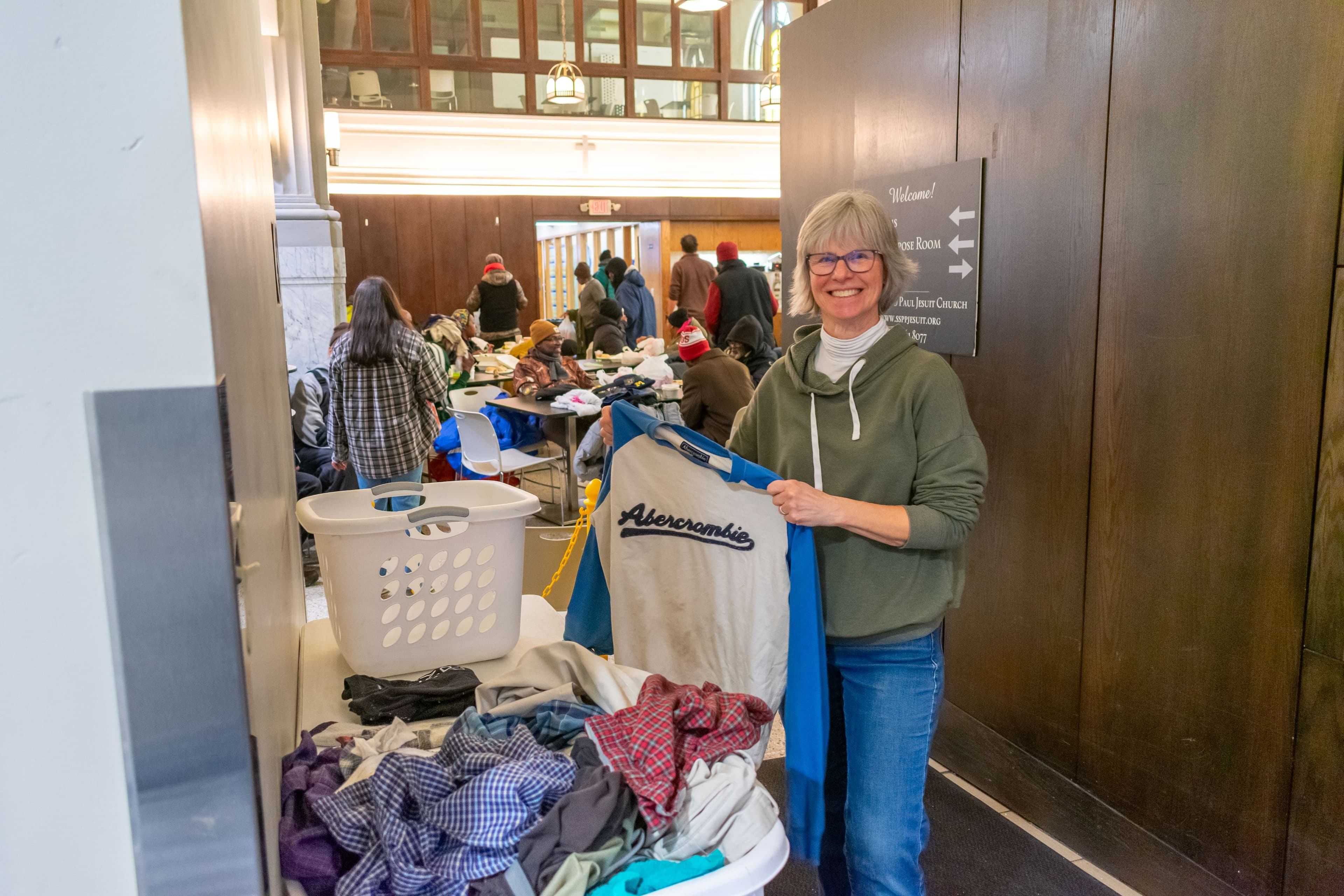 PFC volunteer helping guest