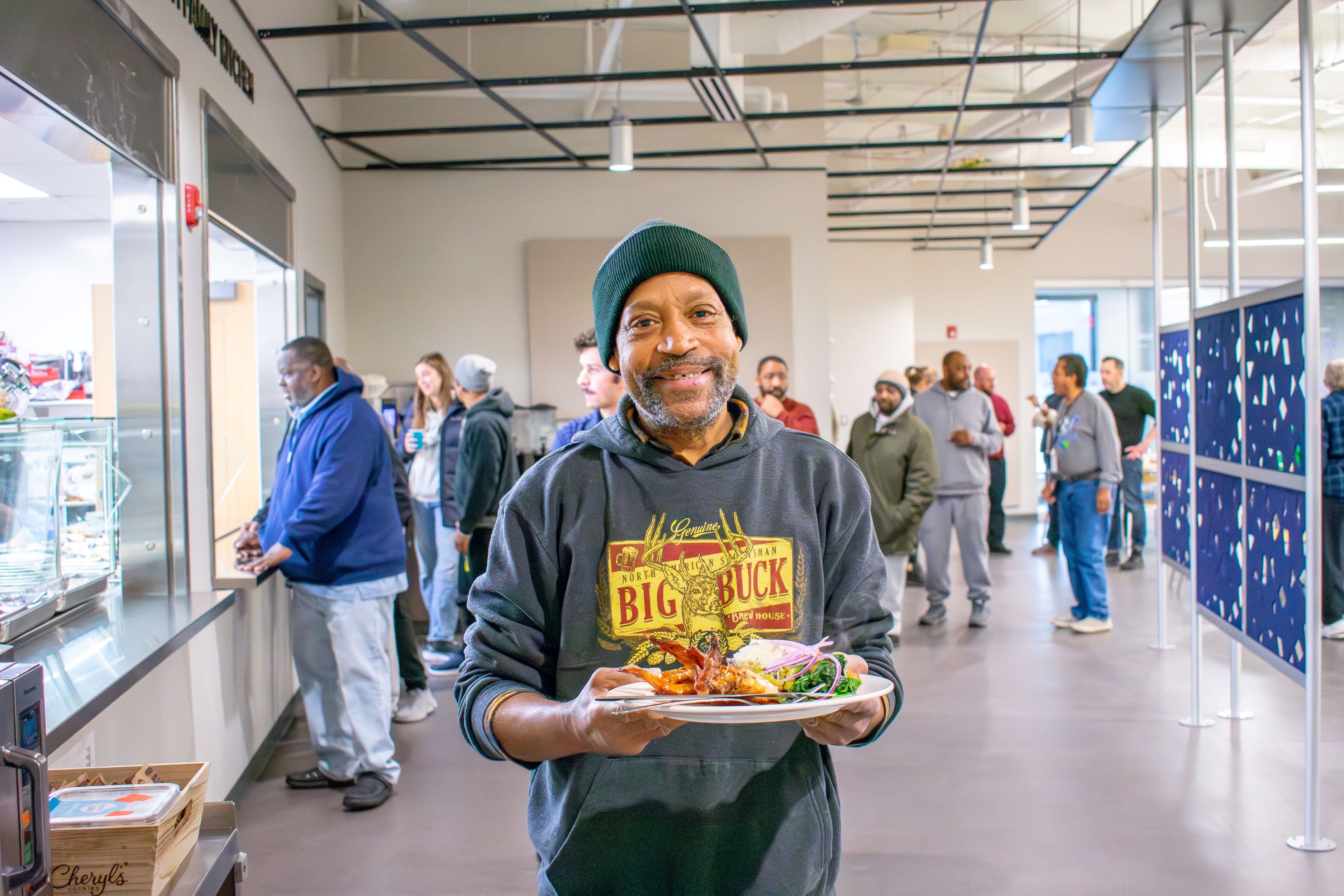 Day Center guests with food
